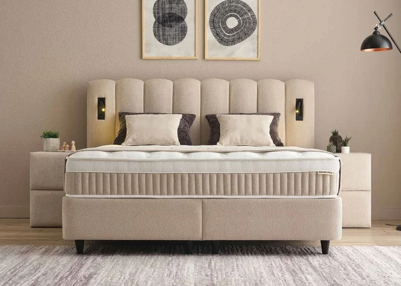 Casa Padrino Luxus Boxspringbett mit gewelltem Kopfteil und Leseleuchten Beige 140 x 200 cm - Luxus Schlafzimmer Möbel