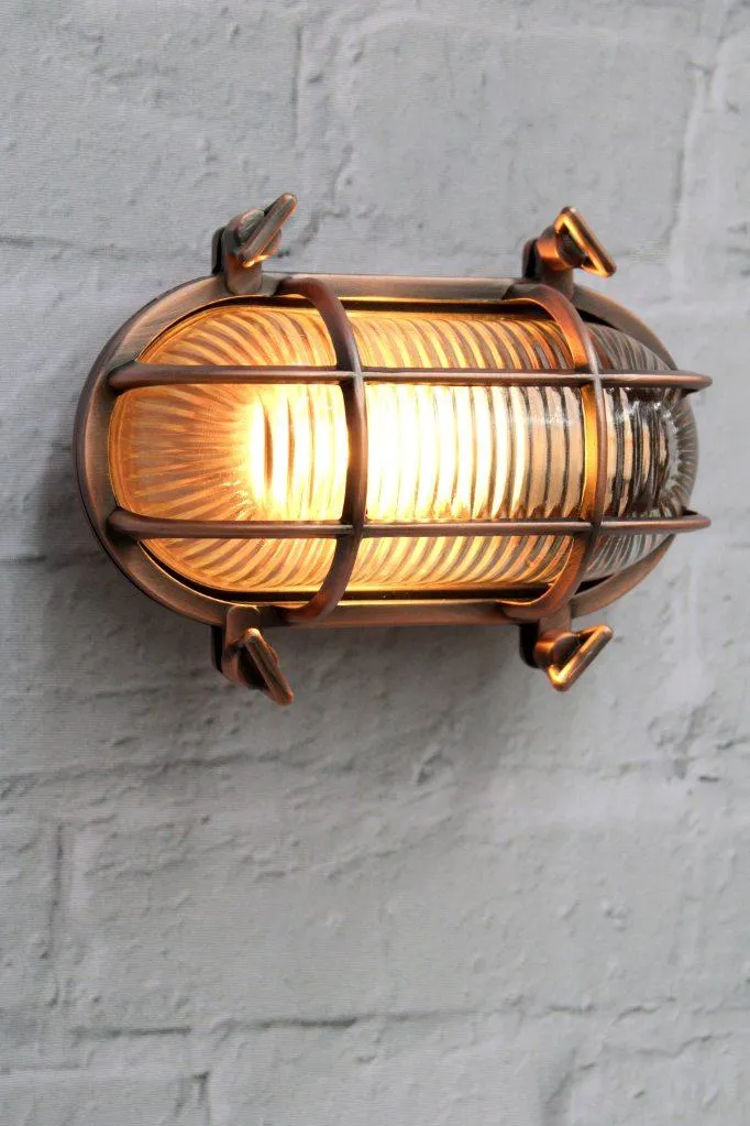 Ovale Buitenwandlamp met Beschermkooi en Geribbeld Glas – Vintage Nautisch Design – IP64 Waterdicht | Sansoti