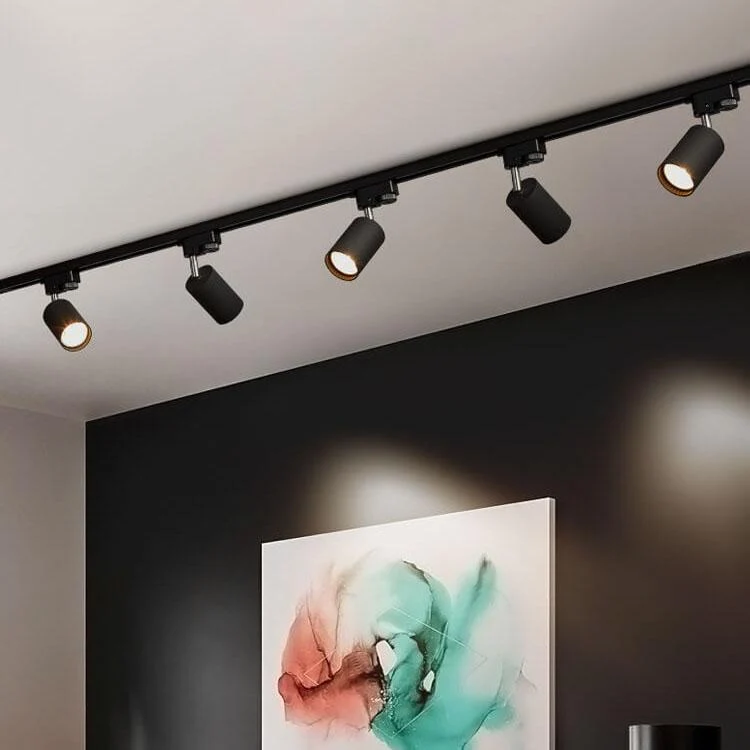 Verstelbaar railsysteem plafond 3-5 spots zwart wit goud dimbaar warm licht modern interieur woonkamer | Sansoti