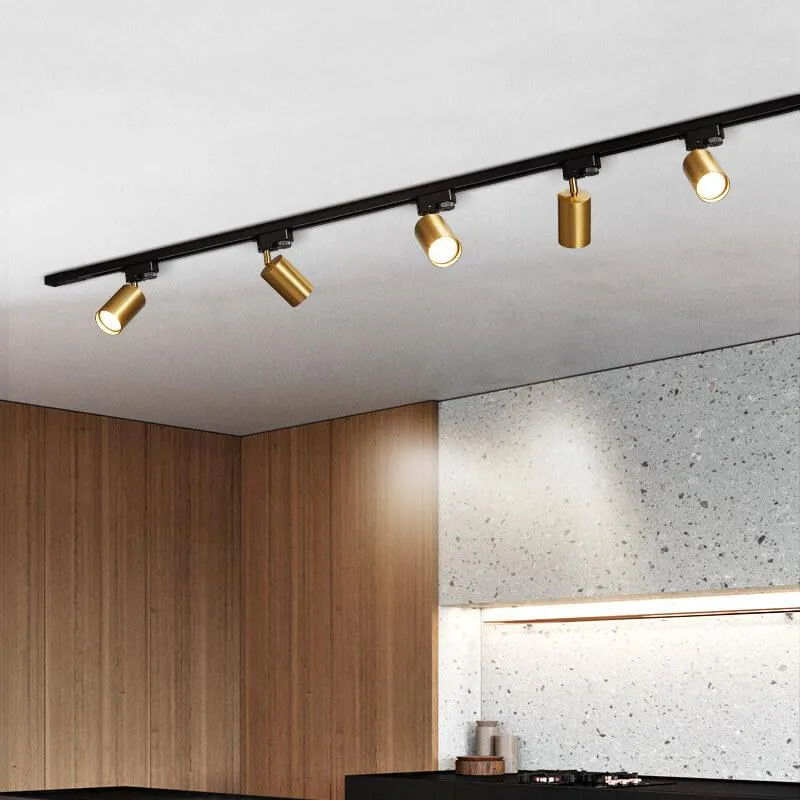 Verstelbaar railsysteem plafond 3-5 spots zwart wit goud dimbaar warm licht modern interieur woonkamer | Sansoti