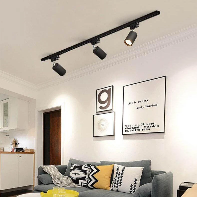 Verstelbaar railsysteem plafond 3-5 spots zwart wit goud dimbaar warm licht modern interieur woonkamer | Sansoti