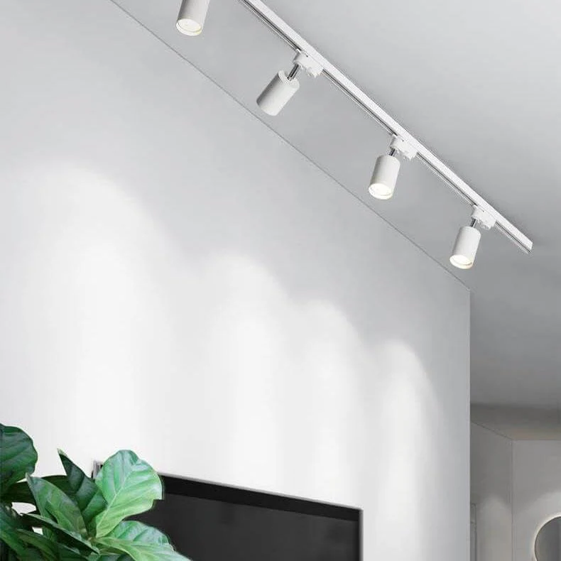 Verstelbaar railsysteem plafond 3-5 spots zwart wit goud dimbaar warm licht modern interieur woonkamer | Sansoti