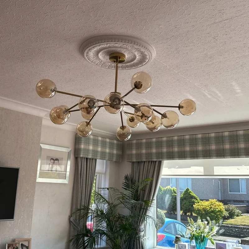 Moderne lineaire sputnik kroonluchter met 15 glazen bollen in zwart of messing – design hanglamp 112 cm | Sansoti