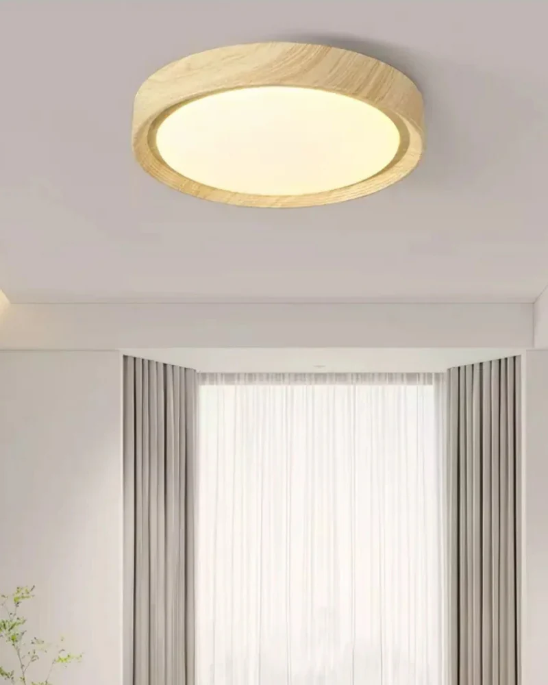 Ronde houten plafondlamp met warm diffuus licht voor serene woonruimtes | Sansoti