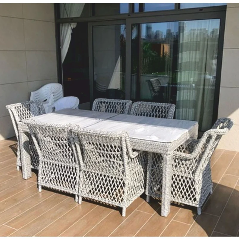 Casa Padrino Luxus Rattan Gartenmöbel Set Grau - 1 Gartentisch & 6 Gartenstühle