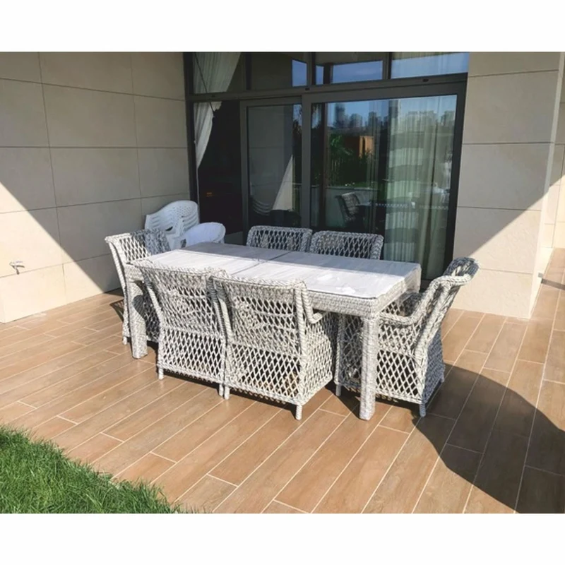Casa Padrino Luxus Rattan Gartenmöbel Set Grau - 1 Gartentisch & 6 Gartenstühle